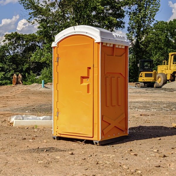 how often are the porta potties cleaned and serviced during a rental period in Lane